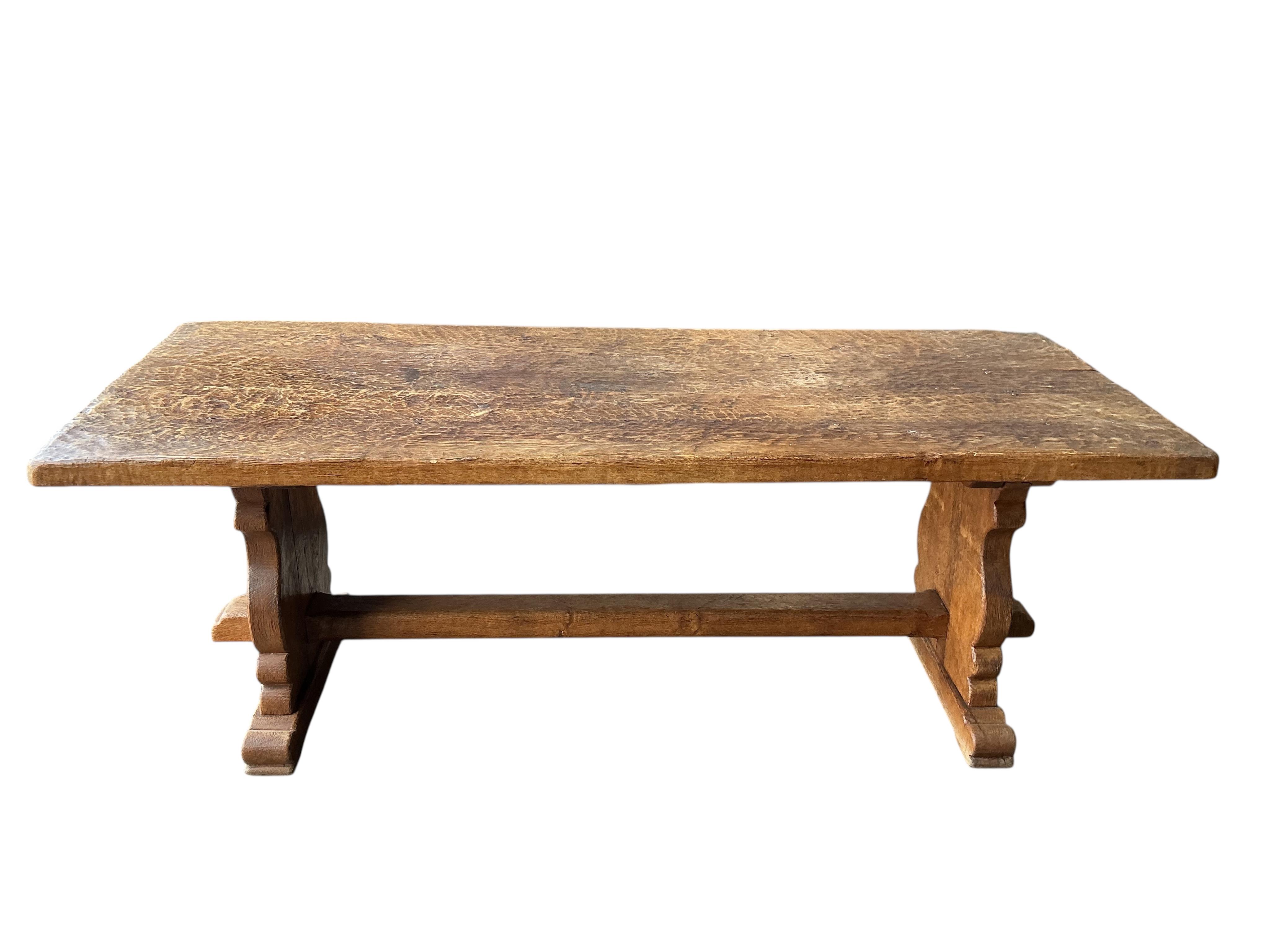 An 18th century style rectangular oak refectory table with adzed single plank top, width 198cm, depth 78cm, height 72cm